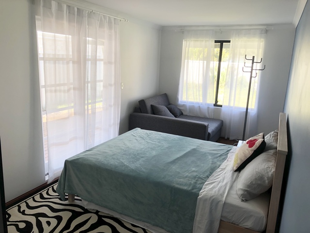 A cozy Queen bed room