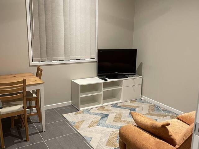 Bedroom and separate lounge area